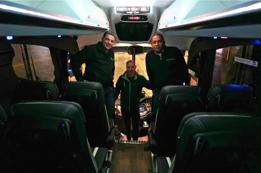 Alston team aboard a coach